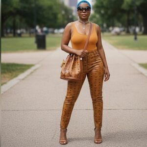 MCM Cognac Leather Drawstring Shoulder Crossbody Bucket Bag with Charm